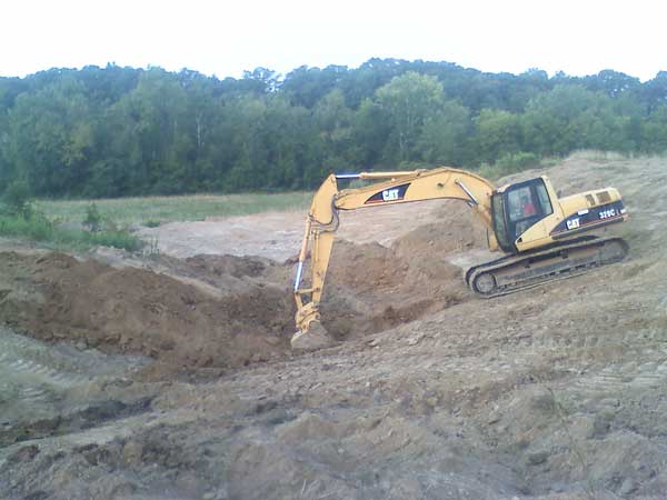 Carl Ball Digging Our Pond